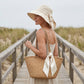 Cappello da donna con fiocco e tesa larga per proteggersi dal sole