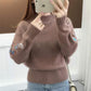 Maglia grossa in cashmere con ricamo floreale