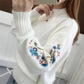 Maglia grossa in cashmere con ricamo floreale