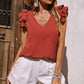 Top stretch senza maniche con scollo a V e volant