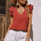 Top stretch senza maniche con scollo a V e volant