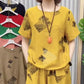 Set donna: top stampato a maniche corte e pantaloni 7/8