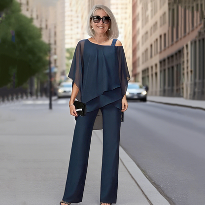 ⏳Sconto a tempo limitato del 50%⏰Top in chiffon irregolare da donna e pantaloni a zampa 2 pezzi👚👖