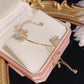 Orecchini con nappe a forma di farfalla