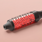 Pettine riscaldato 2 in 1 per lisciare e arricciare i capelli