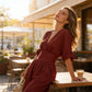 Elegante tuta con scollo a V e pantaloni a zampa