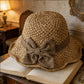 Elegante cappello da sole in paglia intrecciata con fiocco